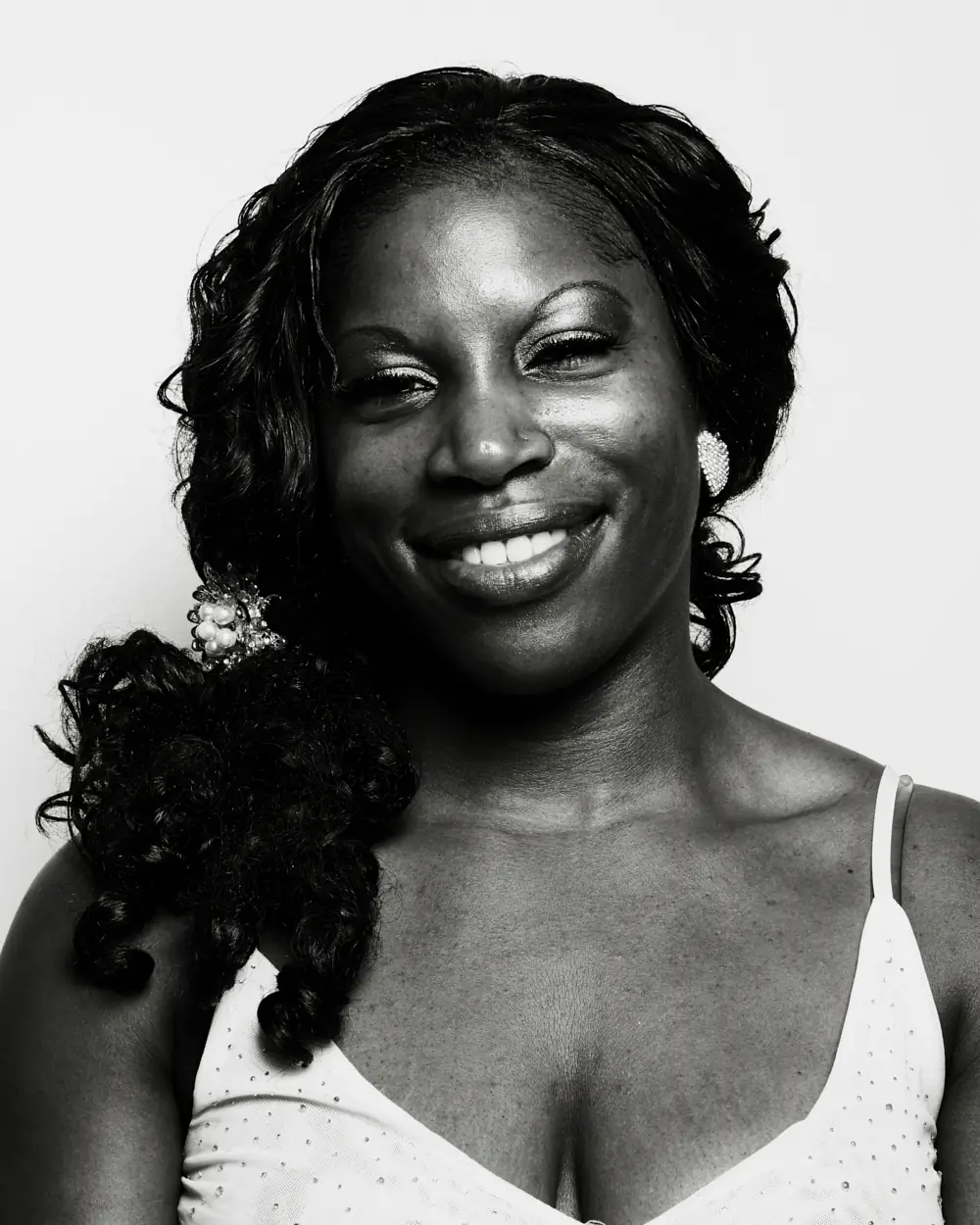 Actor headshot lit to emulate a film-set setup