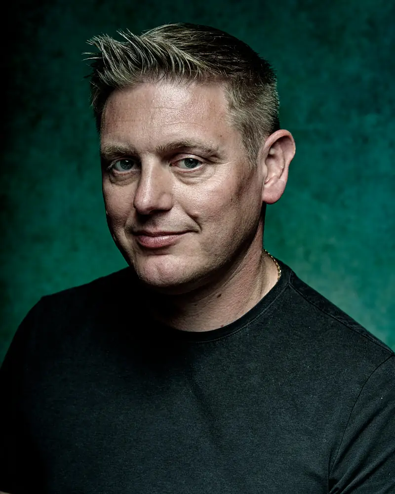 Actor headshot of James Reynolds, studio portrait