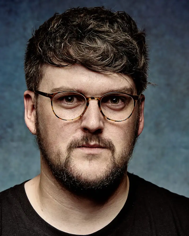 Actor headshot of Matt Collins