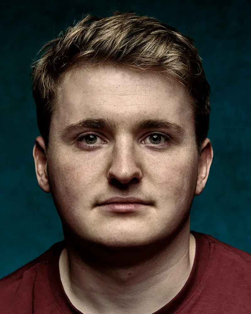 Actor headshot of Simon Newman