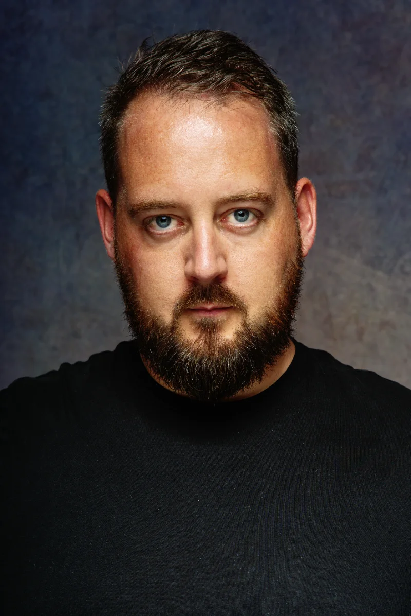 Actor headshot of Tom