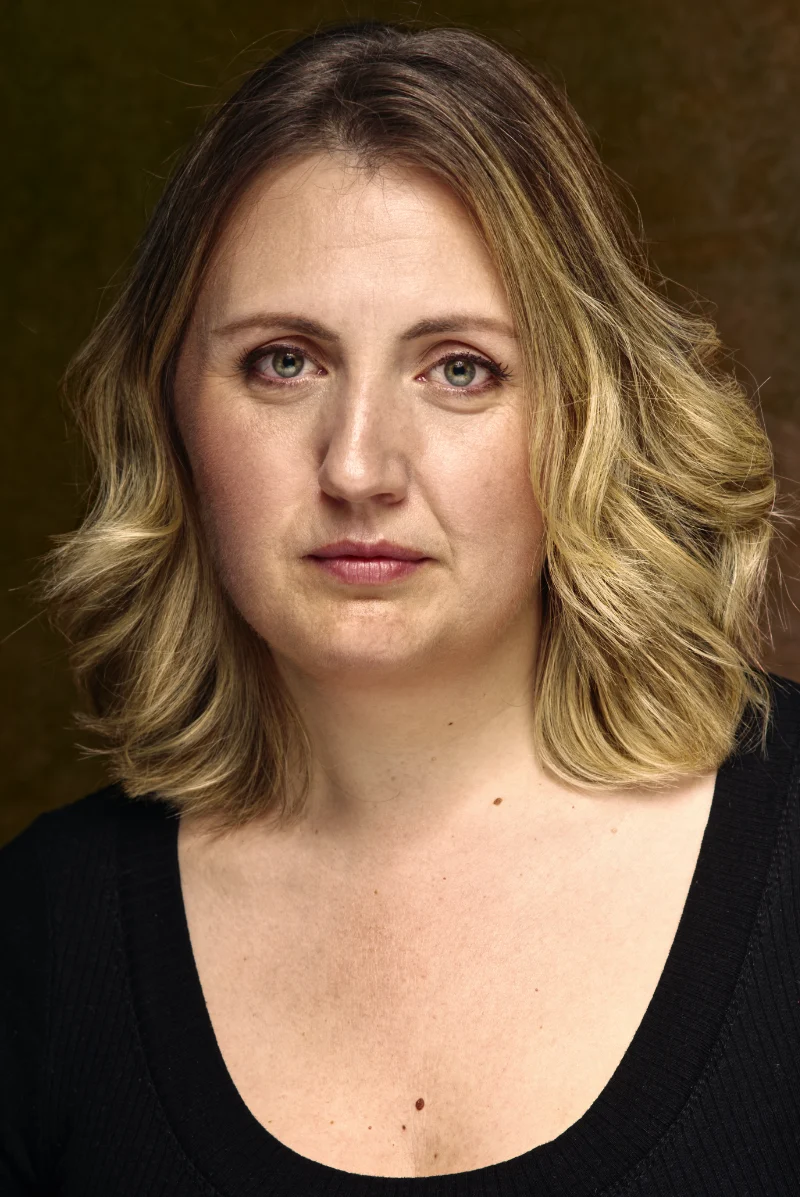 Actor headshot lit to emulate a film-set setup
